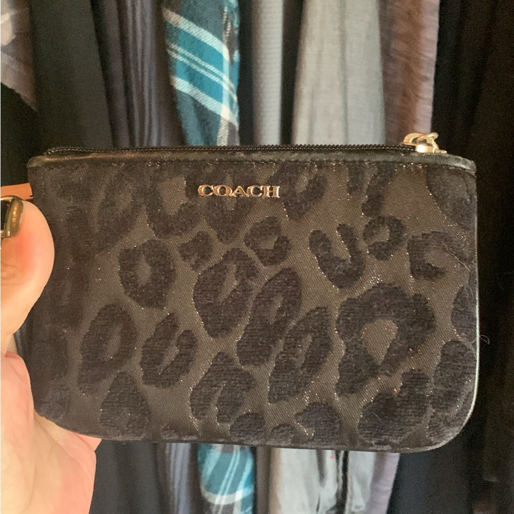 Coach wristlet leopard print . Never used.